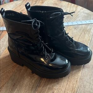 Black shiny boots size 7.5